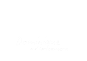 white logo dominique and her camera
